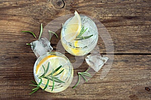 Alcoholic drink with lemon, rosemary