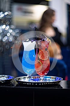 Alcoholic drinks. Barman made stylish modern neon cocktails