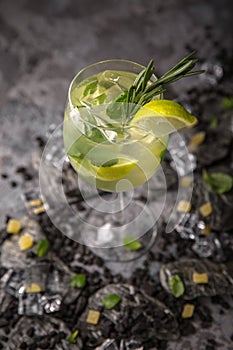 Alcoholic or non-alcoholic cocktail with lemon citrus and ginger with added liqueur, vodka, champagne or martini.
