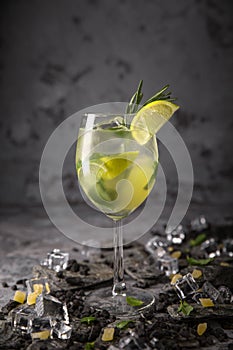 Alcoholic or non-alcoholic cocktail with lemon citrus and ginger with added liqueur, vodka, champagne or martini. Cool drink.