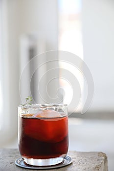 Alcoholic old fashioned cocktail with sault garnish