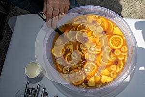 alcoholic punch dish with the fruits floating in the alcohol juice