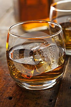 Alcoholic Whiskey Bourbon in a Glass with Ice