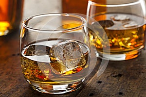 Alcoholic Whiskey Bourbon in a Glass with Ice