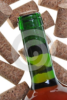 Alcoholism, corks and green bottle