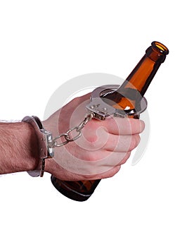 Alcoholism with handcuff and bottle