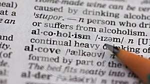 Alcoholism meaning in vocabulary, harmful continual drinking of spirits, abuse