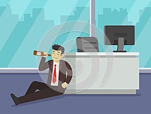 Sad business manager or worker drinking alcohol at work. Drunk male character sitting on the floor and holding bottle.