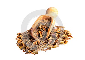 Alder buckthorn bark in wooden scoop. Buckthorn herbal tea is used as a laxative