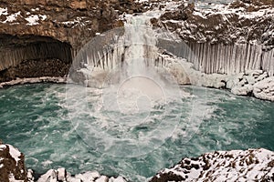 Aldeyjarfoss, icelandic waterfall rounded by basalt columns