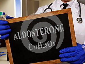 Aldosterone hormone with formula on the blackboard