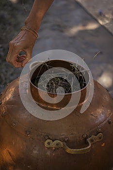 Alembic - copper bowl used for distillation to produce essential oil.