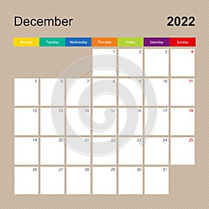 Ð¡alendar page for December 2022, wall planner with colorful design. Week starts on Monday