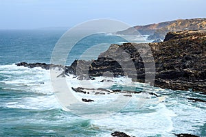 Waving Atlantic Ocean near Cabo Sardao, Portugal photo