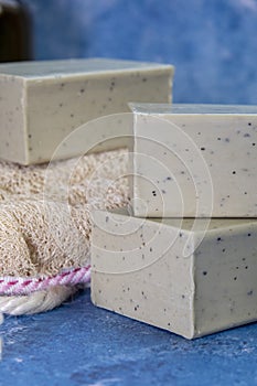 Aleppo soap and dray Laurus nobilis flower in a wooden plate