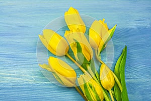 beautiful tulips on the table. spring flowers photo