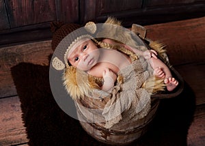 Alert Newborn Baby Boy Wearing a Monkey Hat