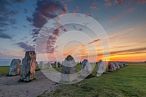 Ales Stenar - An ancient megalithic stone ship monument in Southern Sweden photographed at sunset