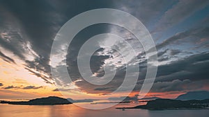 Alesund, Norway. Amazing Natural Bright Dramatic Sky In Warm Colours Above Alesund Valderoya And Islands In Sunset Time