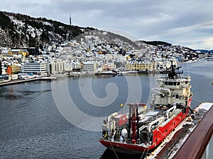 Alesund Norway seaport with town and ship