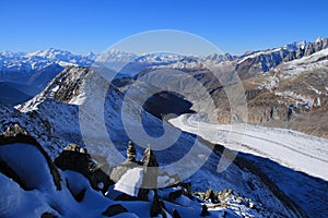 Aletsch Glacier and distant view of the Matterhorn, Weisshorn and other high mountains