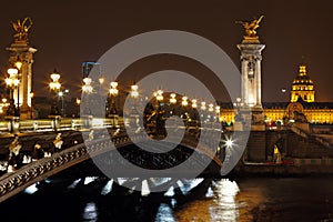 The Alexander III Bridge at night in Paris, France