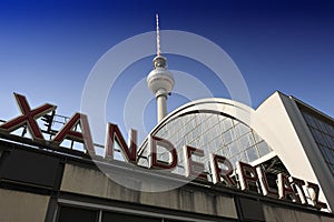 Alexanderplatz station sign and the TV Tower in Berlin
