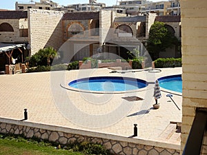 Alexandria, Egypt, September 10 2022: A swimming pool, swimming bath, wading paddling pool, a structure designed to hold water to