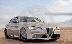 Alfa Romeo Giulia standing in the middle of the desert, Namibia