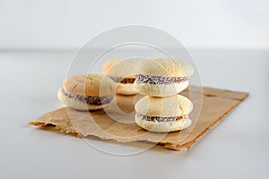 Alfajores, shortbread cookies filled with caramel and rolled in coconut.