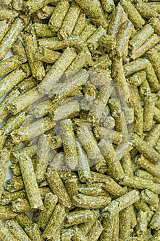 alfalfa close-up, vertical orientation, alfalfa granules