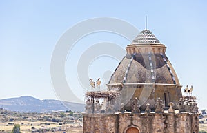 Alfiler tower, Gothic belfry adorned with glazed roof tiles, Trujillo, Spain photo