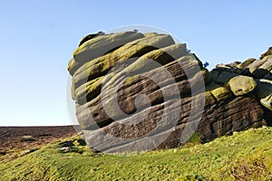 Algae covers the top of the Cowper Stone in Derbyshire