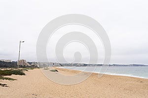 Algarrobo empty beach on cloudy day in Chile photo