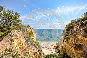 Algarve Portugal: Huge rocks at the cliff beach Praia da Marinha, lovely hidden beach near Lagoa