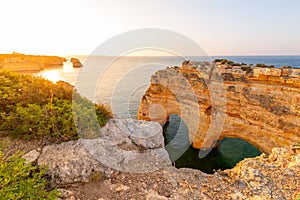 Algarve, Portugal. Praia da Marinha at sunrise photo