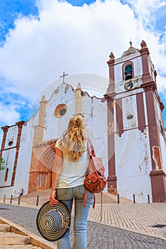 Algarve in Portugal and traveler woman