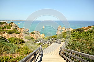 Algarve: Stairs to beach Praia do Camilo near Lagos, Portugal photo