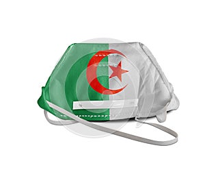 Algeria flag painted on white anti pollution mask for protection from corona virusCOVIT-19
