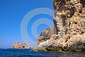 Alghero, Sardinia, Italy - Limestone cliffs of the Capo Caccia cape at the Gulf of Alghero photo