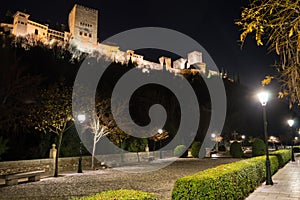 Alhambra in Granada, Spain as seen from Paseo de los Tristes photo