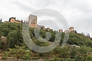 View at the Alhambra citadel on top, from Paseo de los Tristes, walk of the sad (The Promenade of the Sad) photo