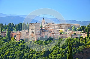 Alhambra palace complex in Granada, Spain taken on a sunny day. One of Spain`s major tourist attractions photo