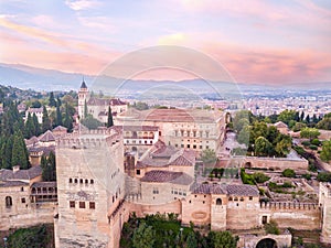 Alhambra. palace and fortress complex located in Granada, Andalusia, Spain. Sunrise. Aerial photo from drone