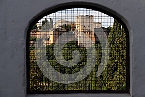 Alhambra palace from window in Sacromonte, Granada.
