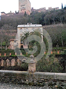 The Alhambra from of Paseo de los tristes- AlBAYZIN-Granada-Spain photo