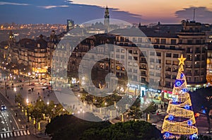 Aerial view of Aliados / Liberdade Square and Clerigos Tower town of Porto. Sunset view with winter Christmas tree, Lisbon