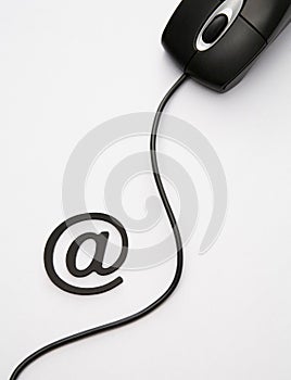 Alias symbol beside computer mouse. Conceptual image