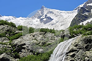 Alibek waterfall. Dombay mountains. The Northern Caucas photo