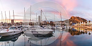 Alicante Port d`Alacant marina with boats and view of castle Castillo evening travel traveling holidays vacation panorama in Spai photo